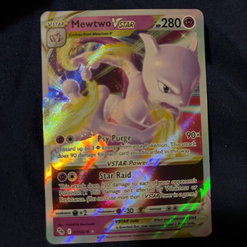 Pokemon Mewtwo VSTAR Card with Holographic Purple and Gold